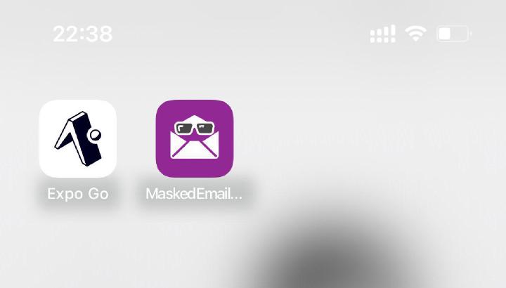 The finished purple envelope-with-sunglasses icon on an iPhone home screen next to Expo Go